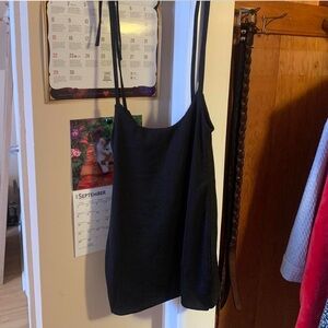 •Black Skirt w/ Slit, Ties On Shoulders, Wear w/ Top Underneath
•No Brand
•Small